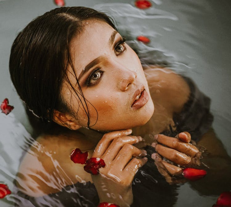 Beautiful Woman In Pool Looking Up