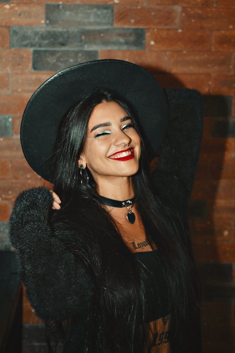 Beautiful Brunette Woman With Hat Smiling