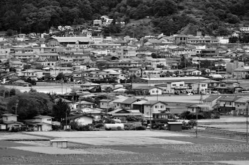 A black and white photo of a town