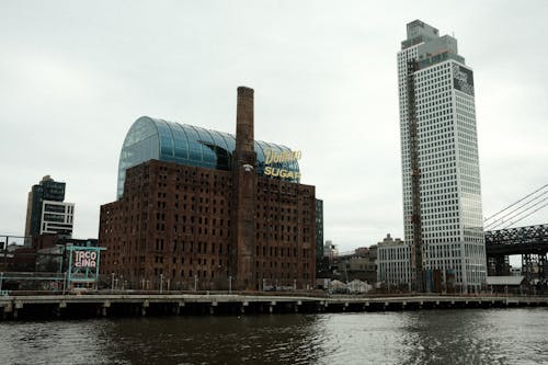 A large building with a bridge in the background