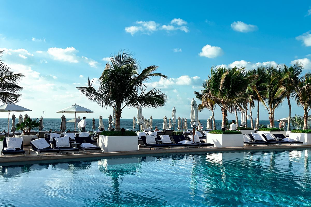Luxury resort pool where resort fees at five star hotels may cover shared amenities