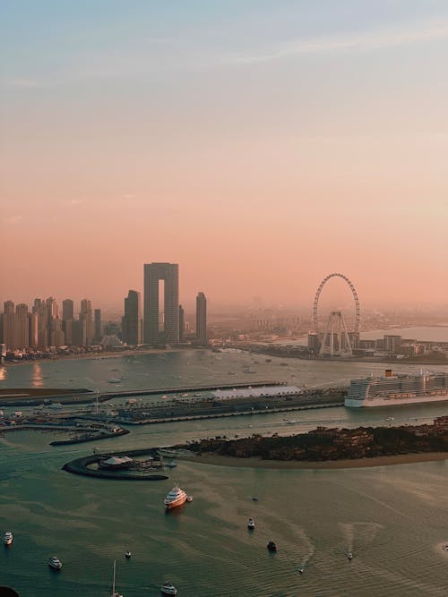 A view of the city of dubai at sunset