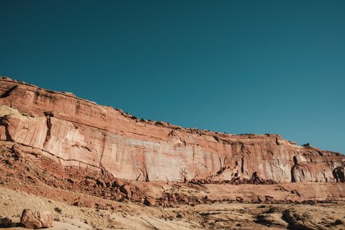 Free A stunning view of a red rock canyon with a clear turquoise sky, showcasing the beauty of natural landscapes. Stock Photo