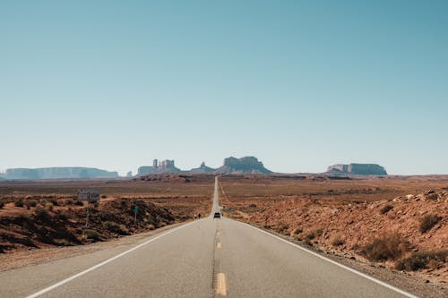Sunlit Road in Monument Valley in USA