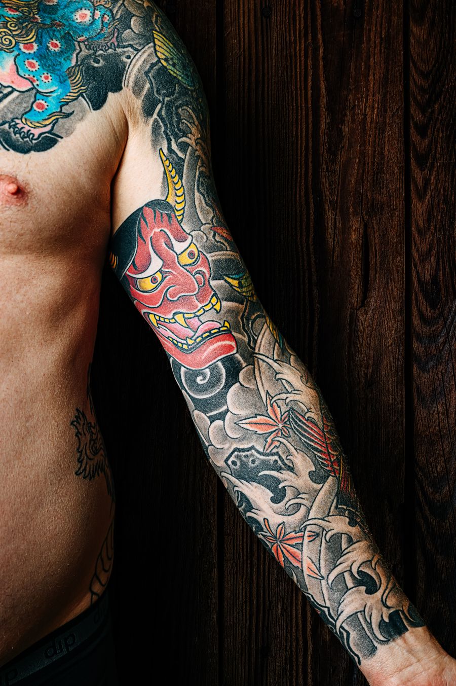 Close-up tattoo detail showing fine line work