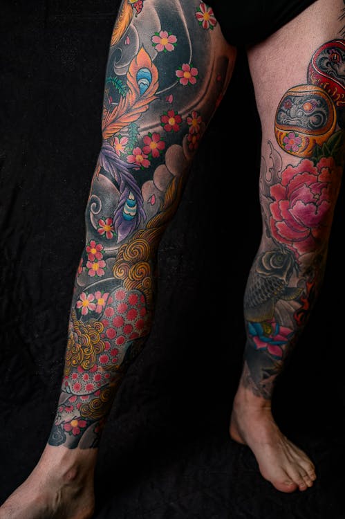 Free Legs Covered With Tattoos Stock Photo