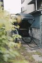 Black Rickshaw on Narrow Pathway