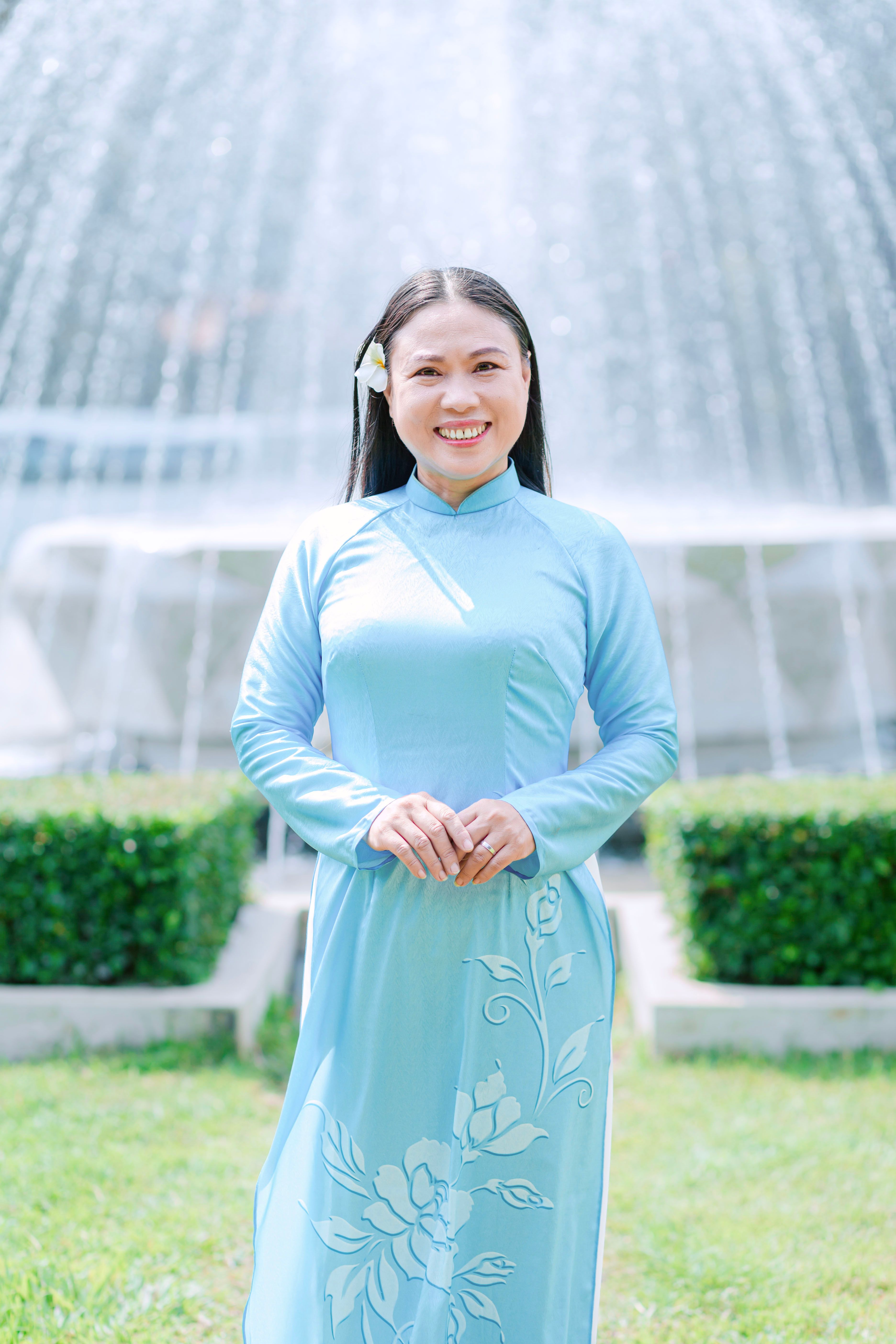 A Woman in a Blue Dress  Free Stock Photo