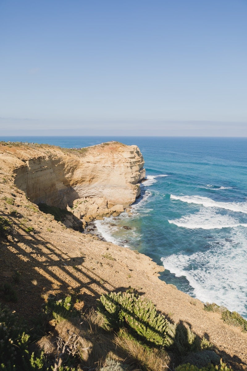 Aerial photography of cliff near ocean