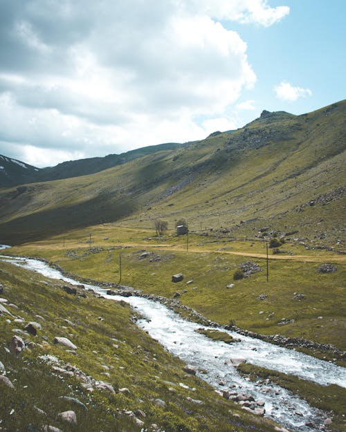 Kostnadsfri bild av berg, flod, kulle