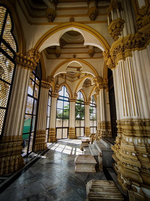 Free Explore the detailed arches and columns of Mahabat Maqbara's Mughal architecture. Stock Photo