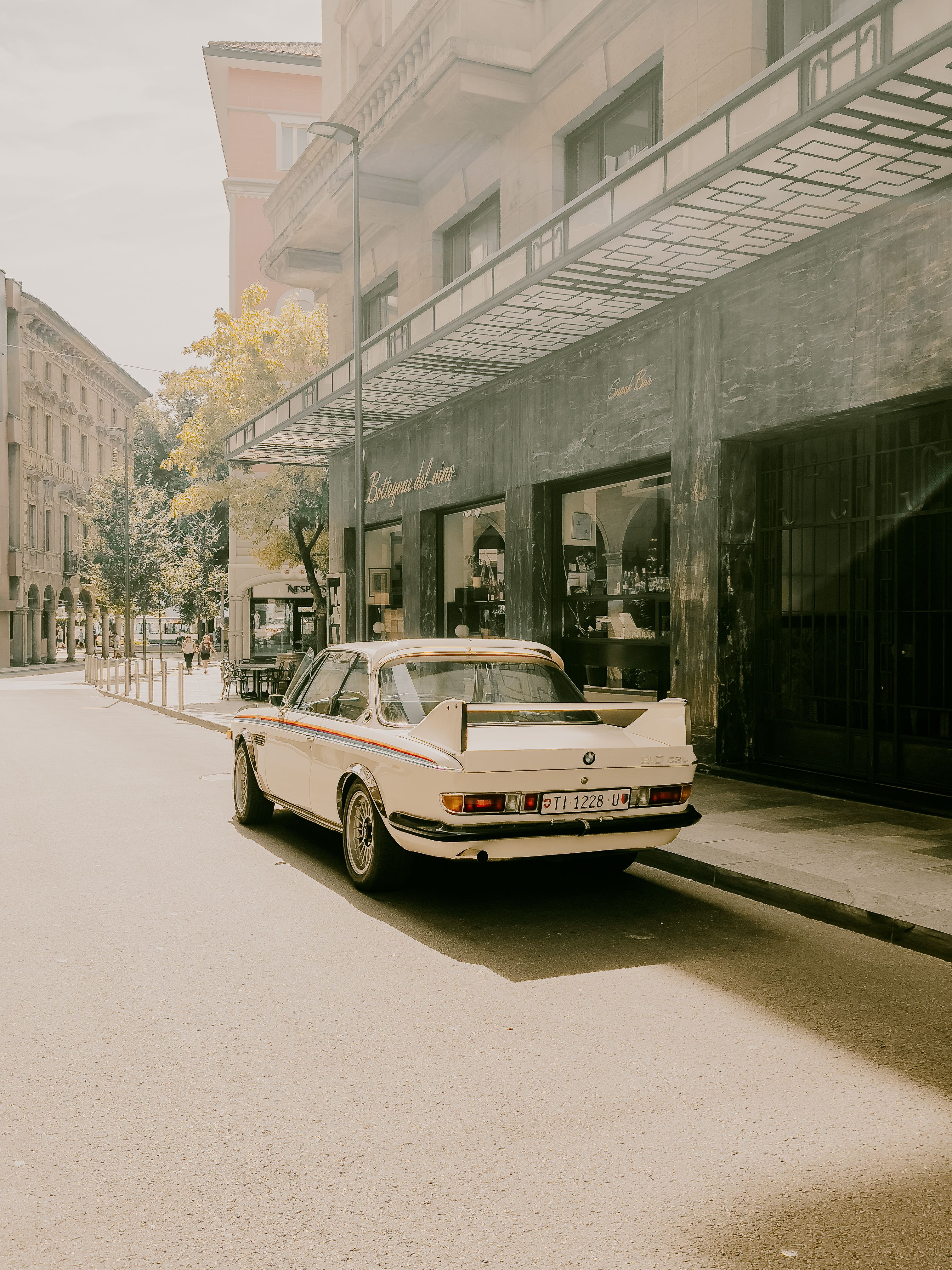 A car parked on the side of the street · Free Stock Photo