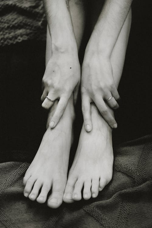 A black and white photo of a woman's feet