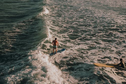 A surfer is riding a wave in the ocean