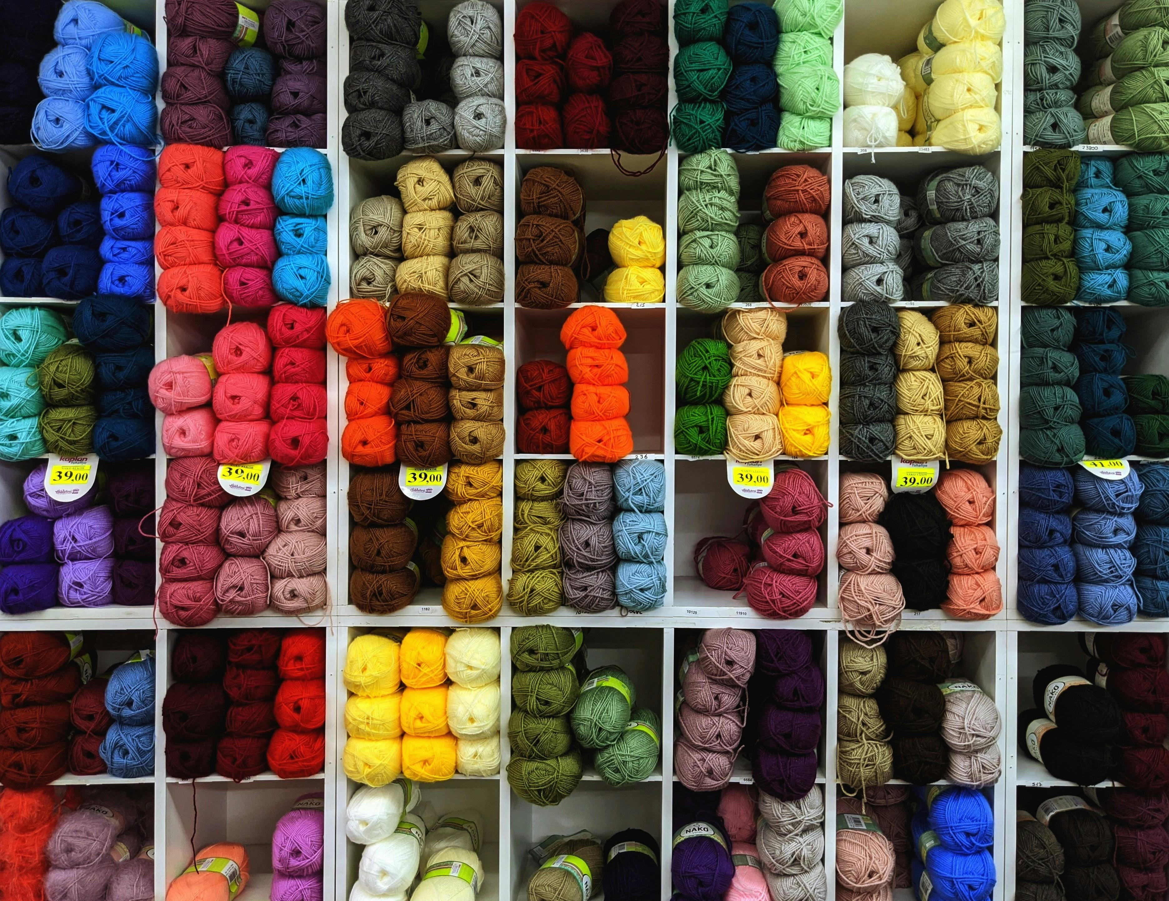 a large display of yarns and yarns in a store