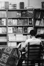 Man Sitting in Library