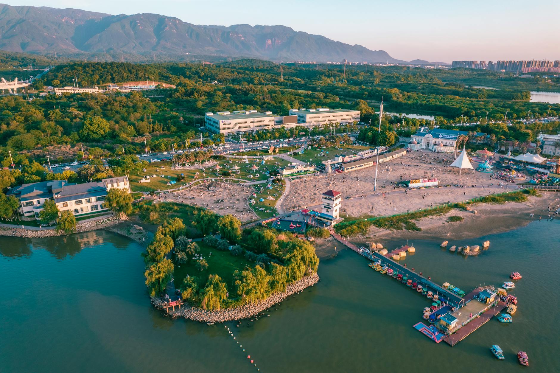 A tranquil harbor in Greece with blue waters and small colorful boats