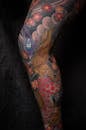 Multicolored Floral Leg Tattoo
