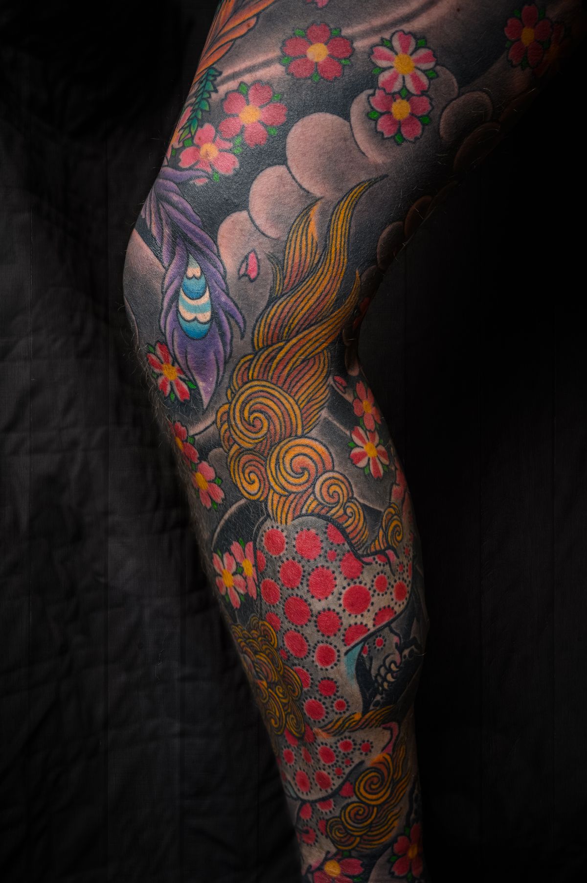 Tattoo artist working