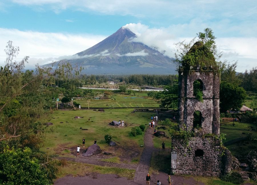 Cagsawa Ruins with Mayon Volcano in the background, depicting historical and natural beauty of Daraga, Philippines.