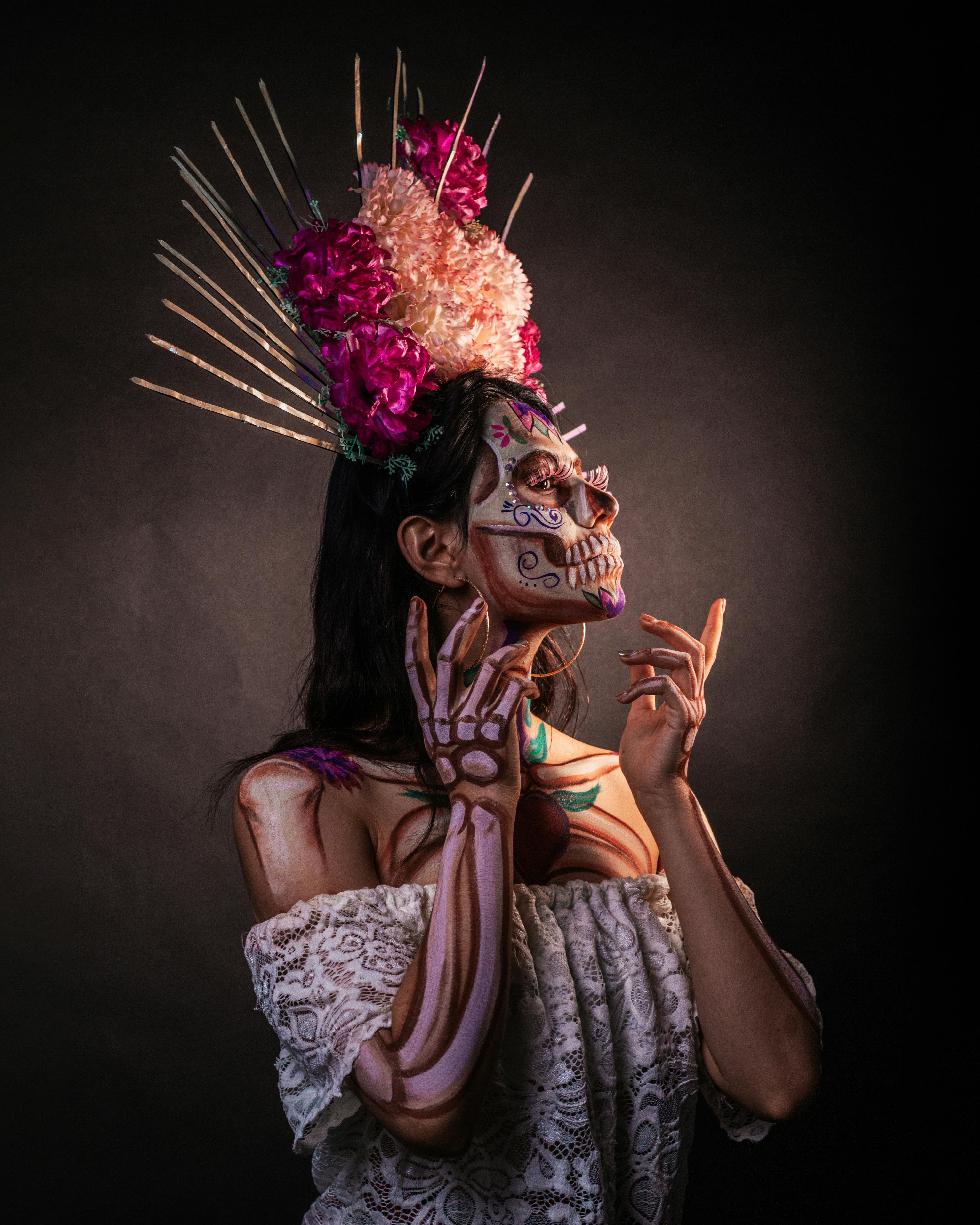 studio shot of woman dressed as catrina