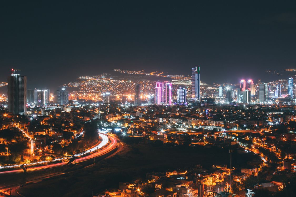Aerial View of Illuminated Skyscrapers in a City at Night · Free Stock ...