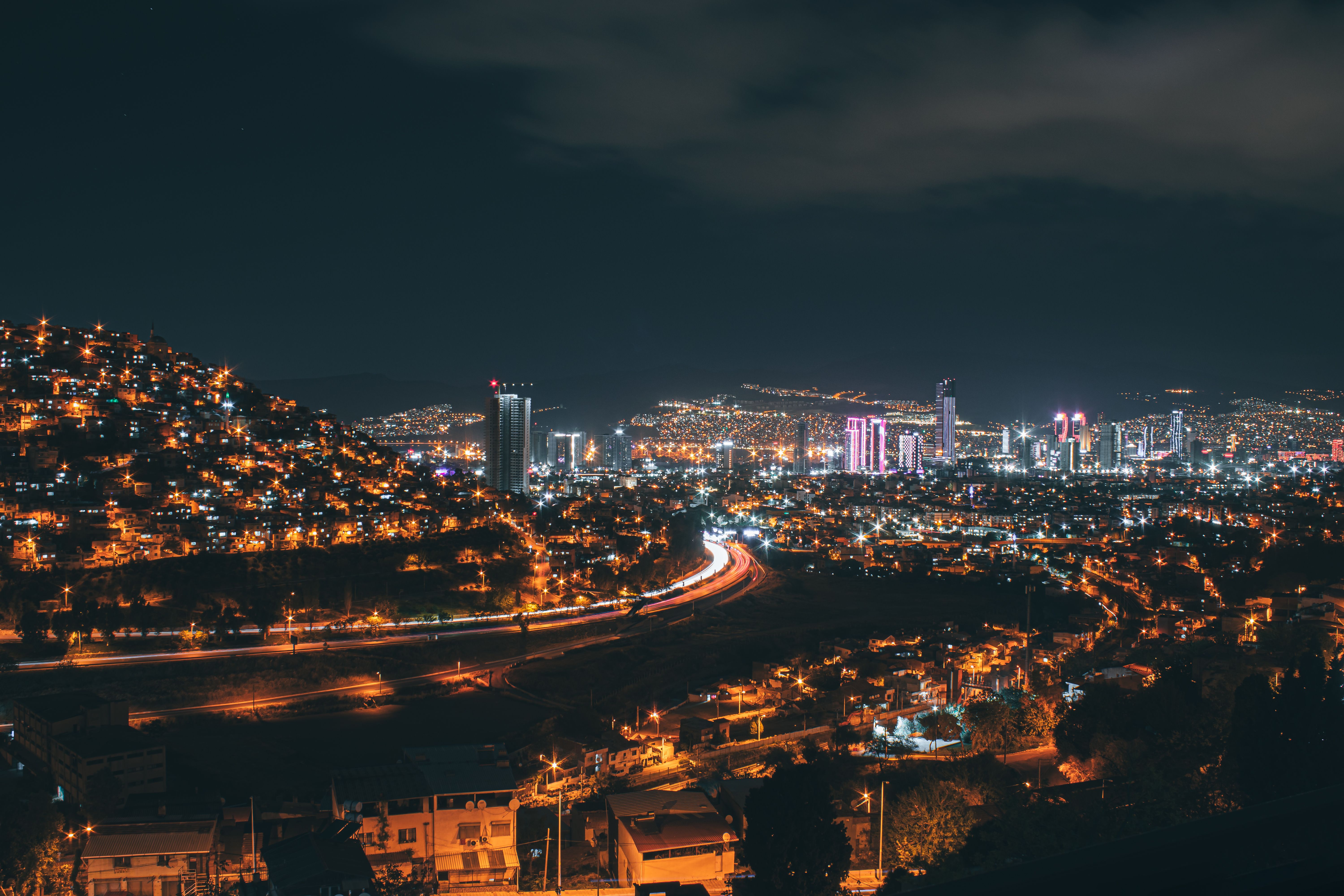 Aerial View of Illuminated Skyscrapers in a City at Night · Free Stock ...