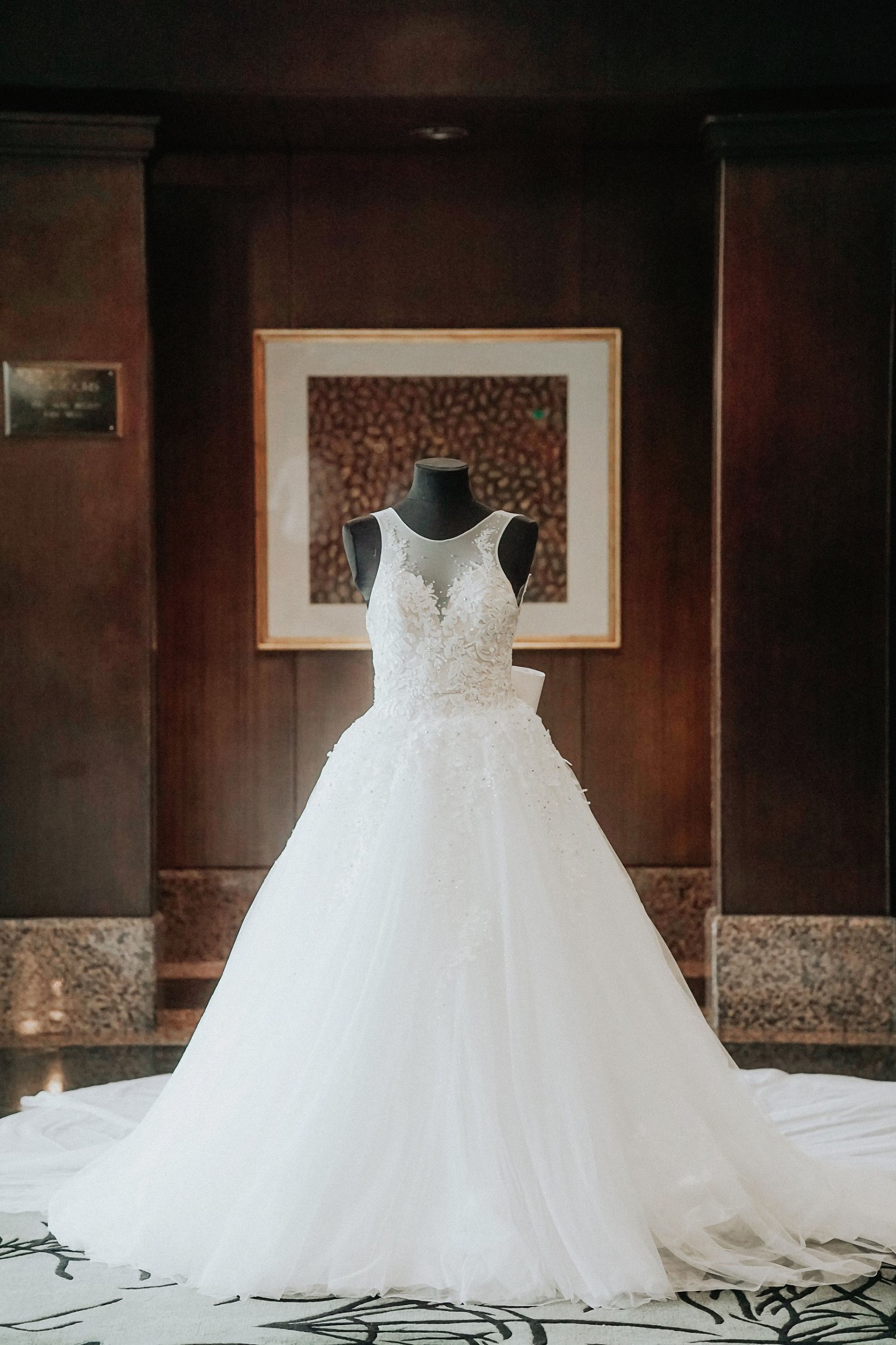 Wedding Dress on Black Mannequin  Free Stock Photo
