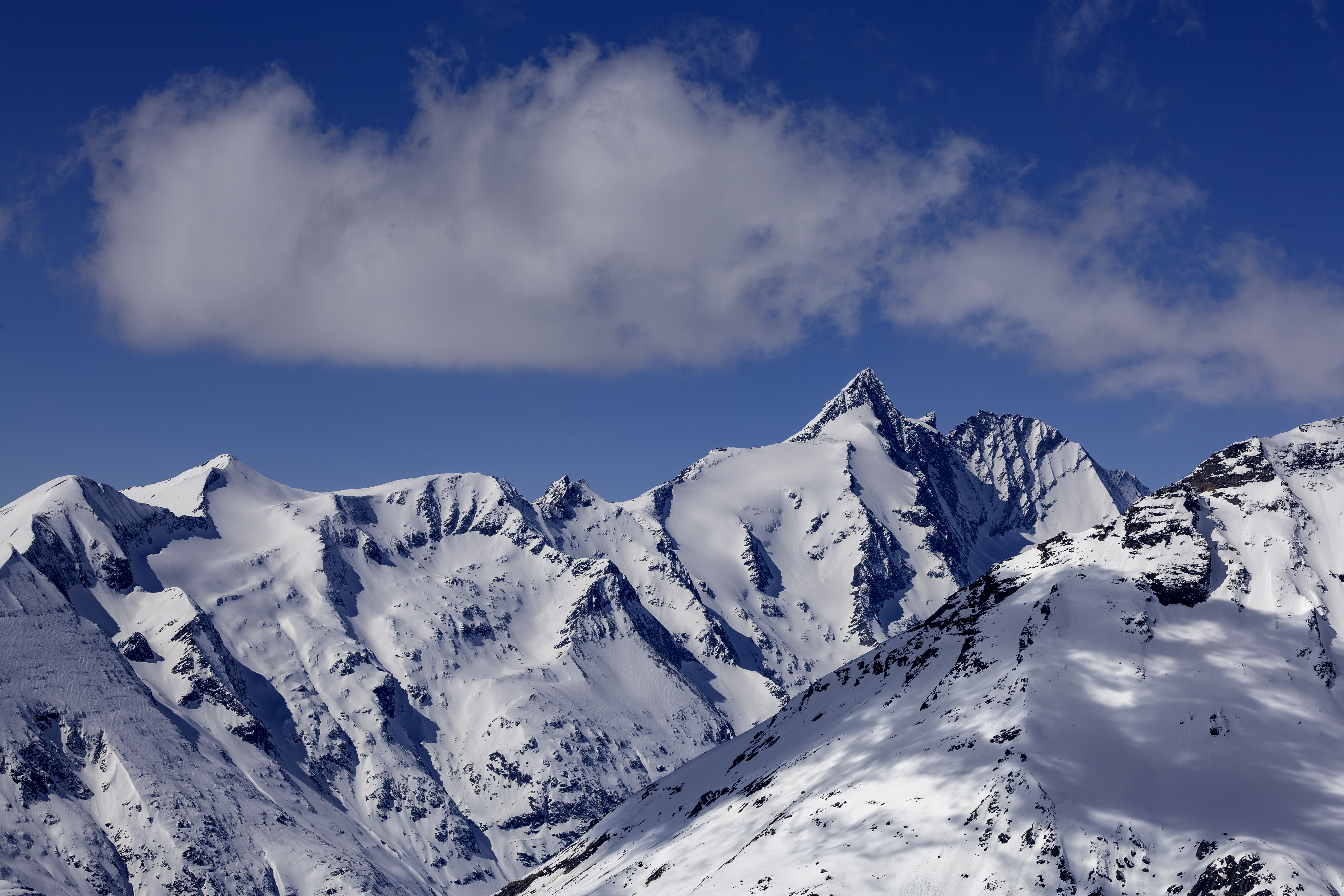 Snowcapped Range of Alpine Mountains · Free Stock Photo