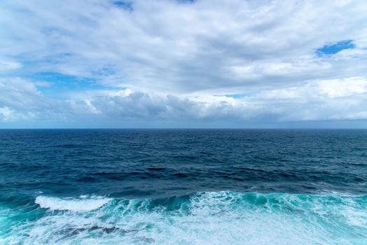 Beautiful ocean view under a dramatic sky, capturing nature's tranquility and power.