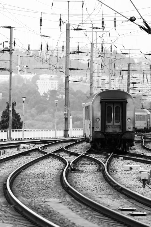 Free Black and white photo of a train at a railway station in Porto, Portugal. Stock Photo