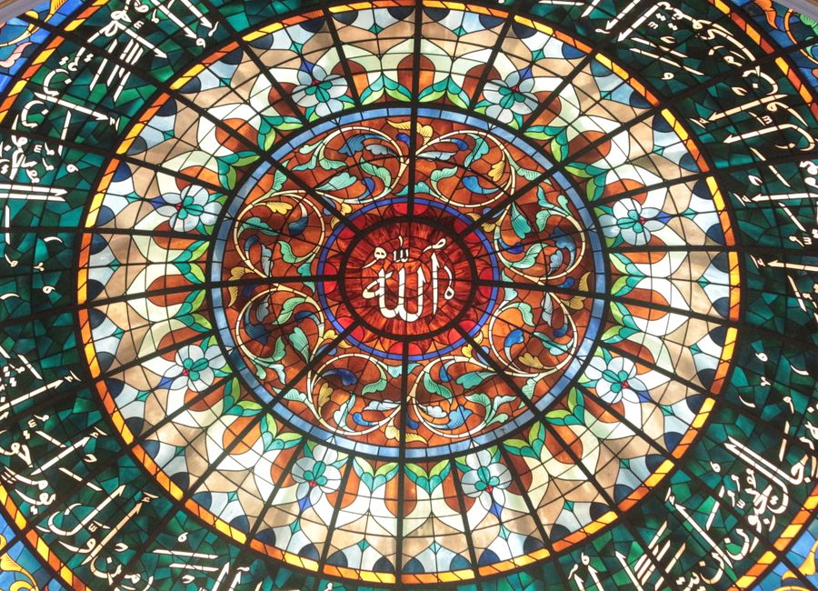 Stunning stained glass dome featuring Islamic designs at Jame Asr Hassanil Bolkiah Mosque in Brunei.