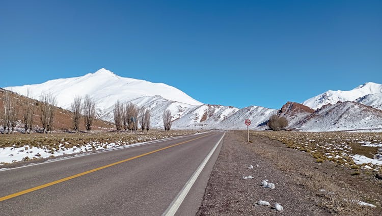 Road Near Hills In Winter 