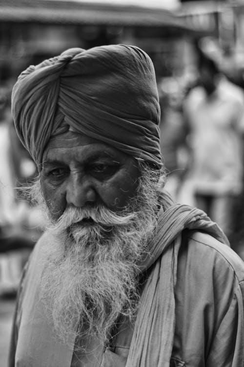 An old man with a turban and beard