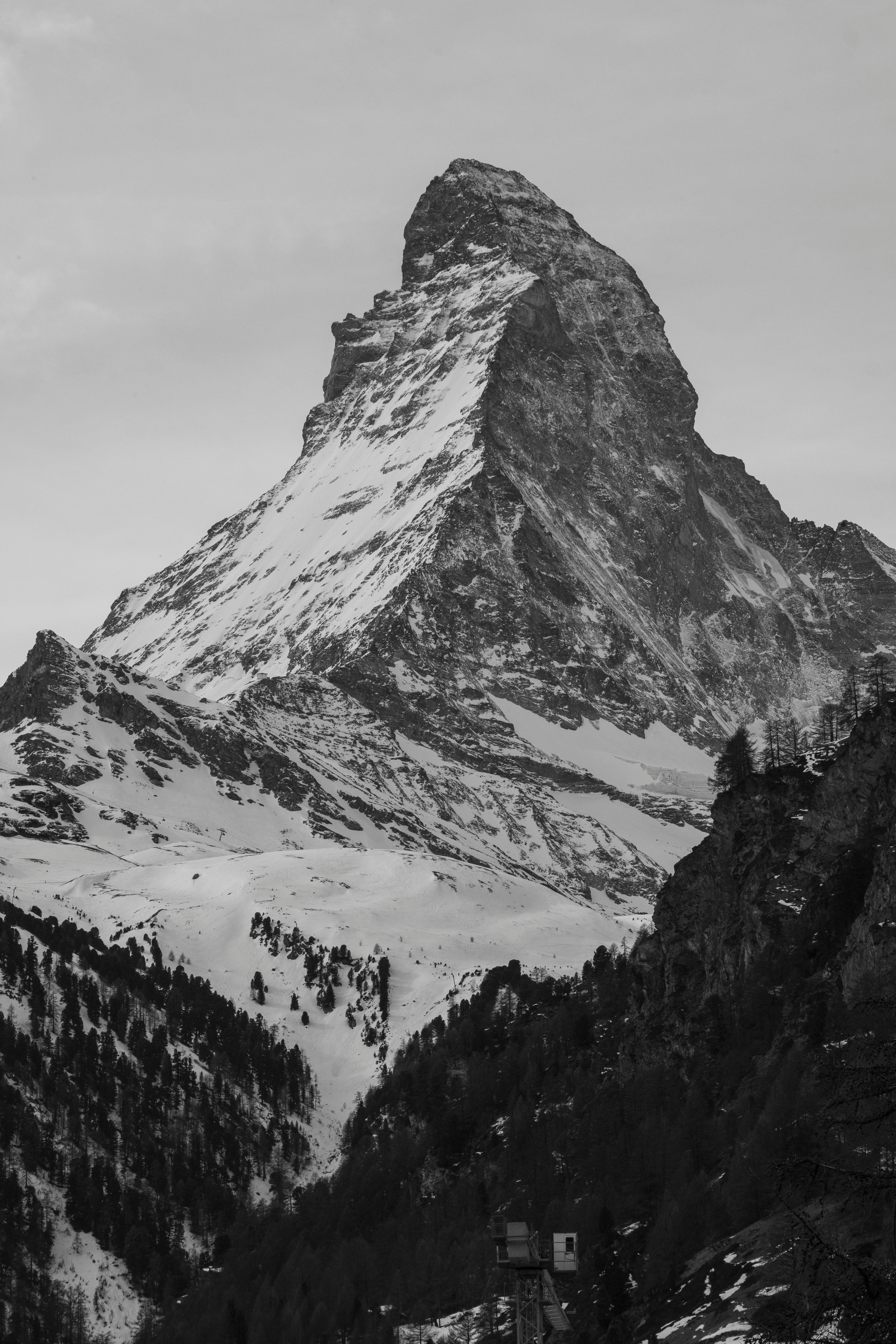 A stunning black and white view of the snowcapped Matterhorn in winter, located in Zermatt, Switzerland.