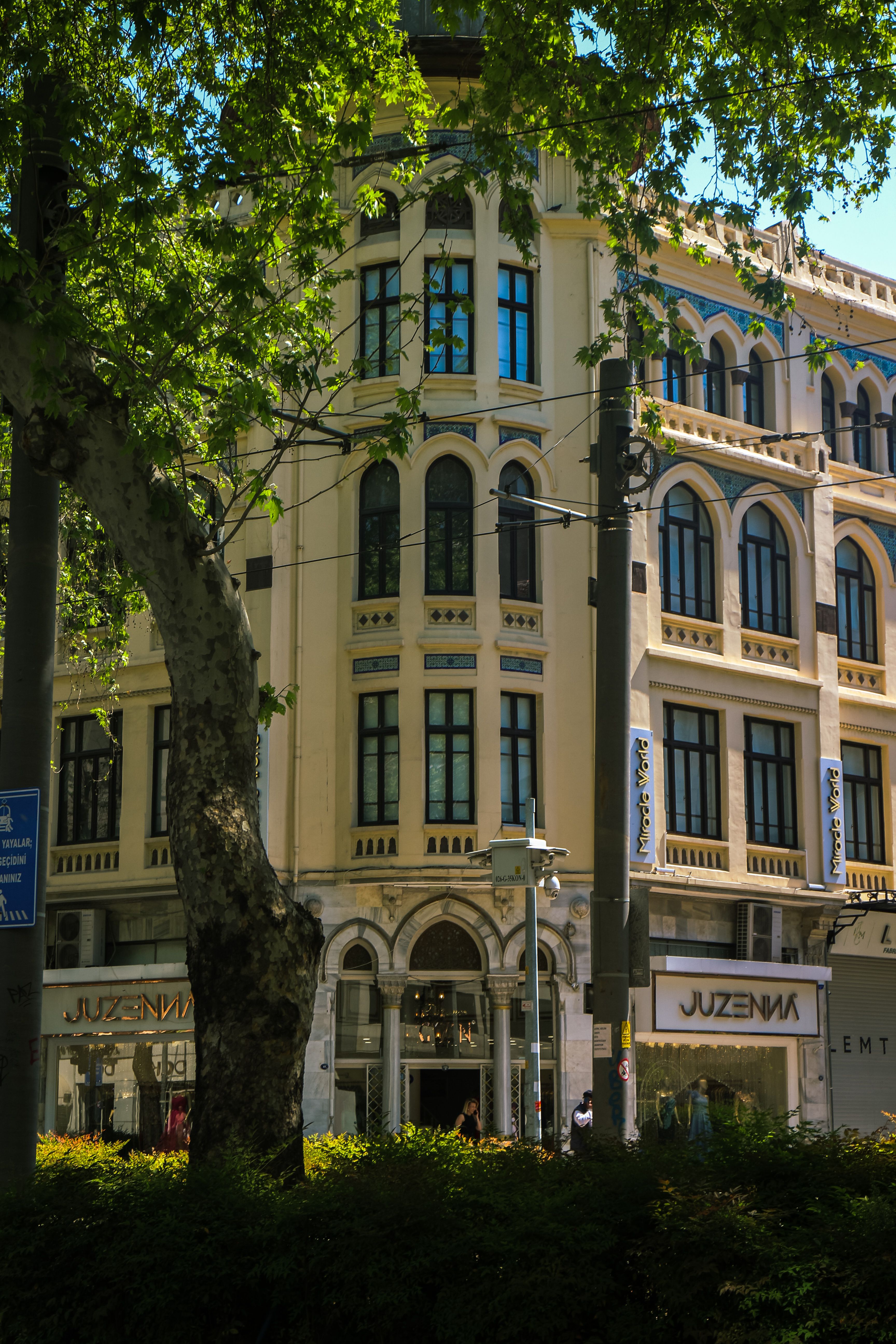 A stunning historic building in Izmir, showcasing urban architecture amidst nature.