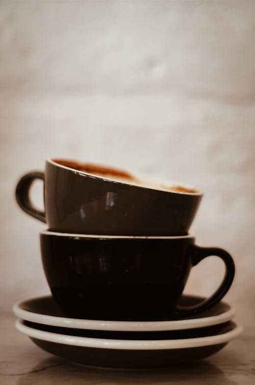 Free Two Black and Brown Teacups Stock Photo