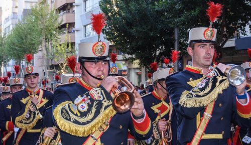 Free Military band parade with soldiers playing instruments in Jaén, Spain. Stock Photo