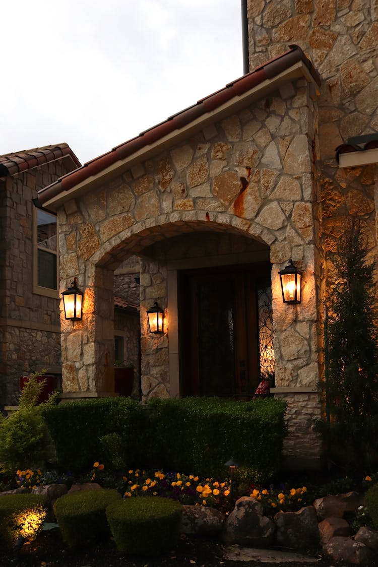 Vintage Lamps On Stone Building Wall