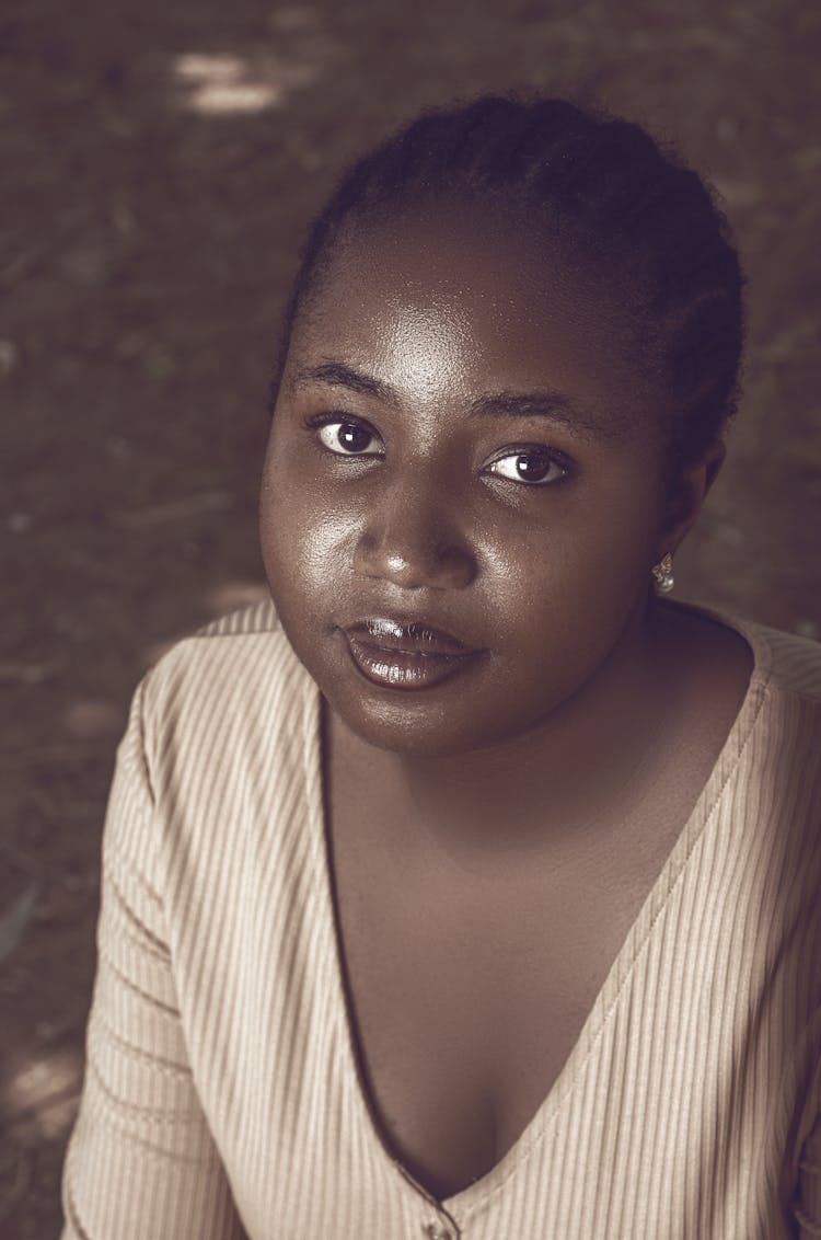 Beautiful Woman In Sweater Looking At Camera