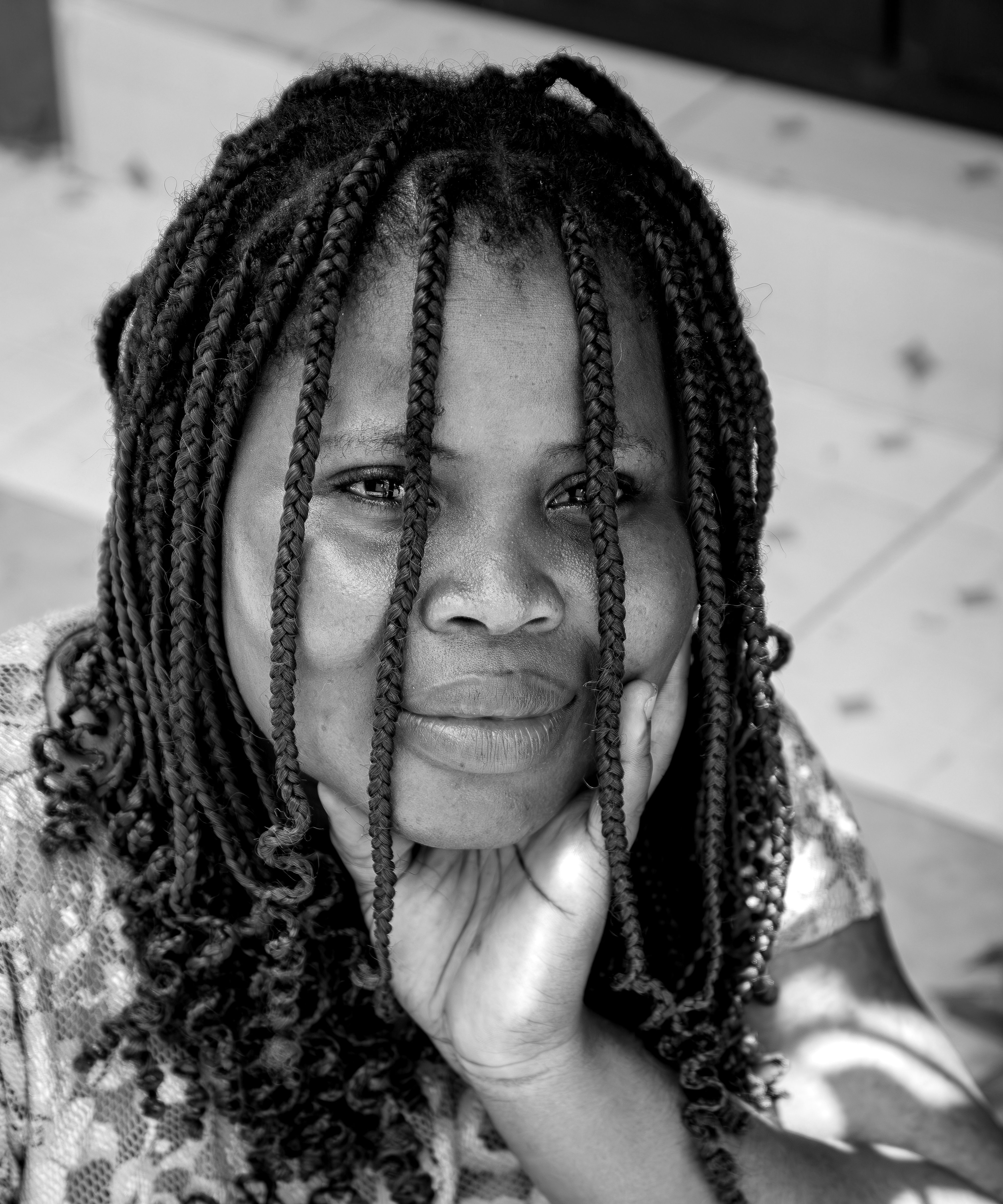 Black and White Portrait of a Woman with Braided Hair · Free Stock Photo