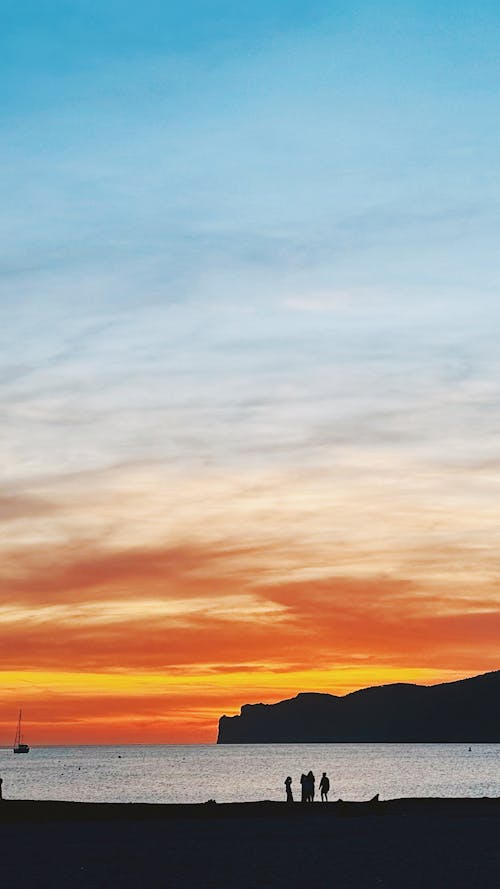 Fotos de stock gratuitas de cielo hermoso, playa, puesta de sol