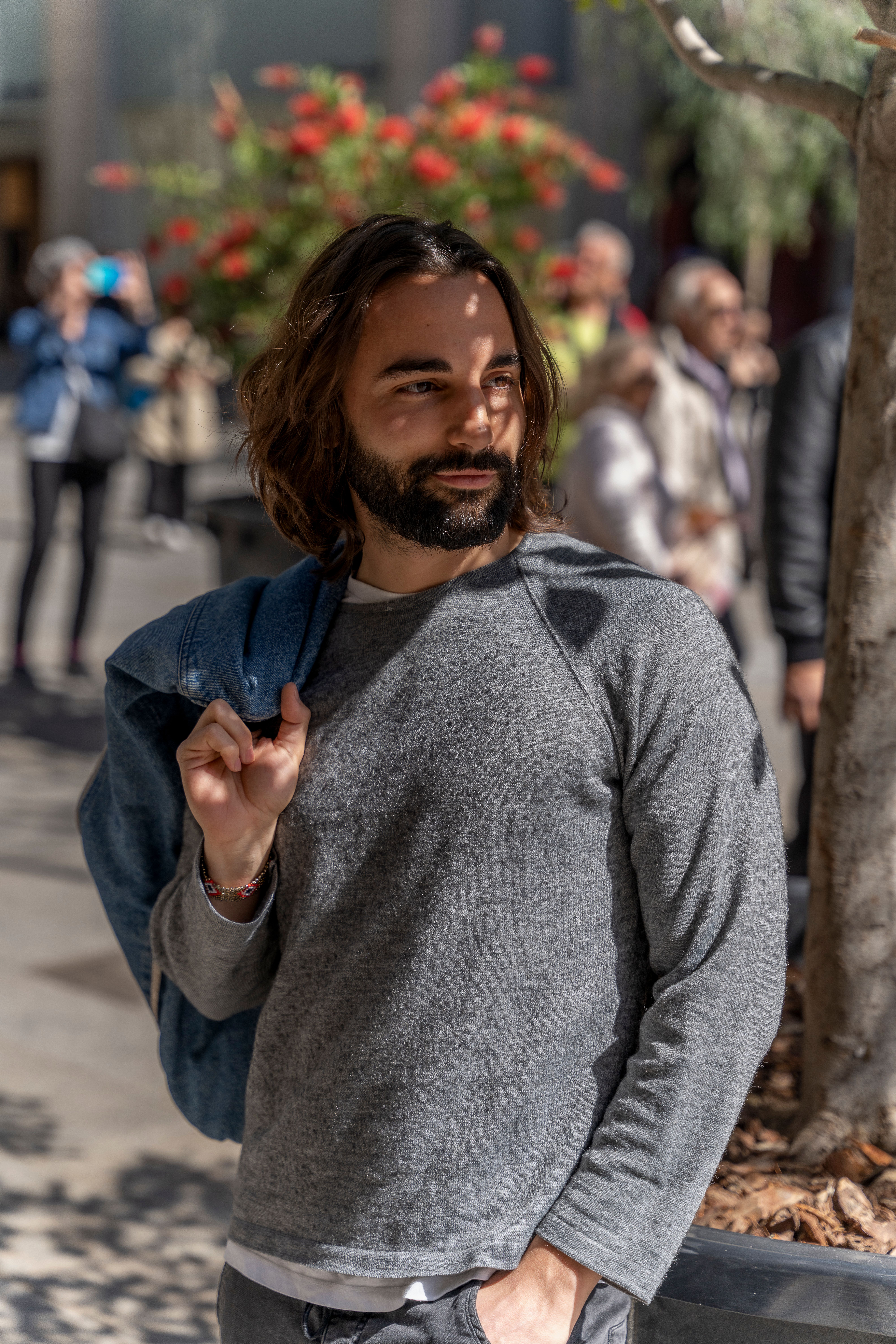 Portrait of a Man in a Grey Sweater · Free Stock Photo