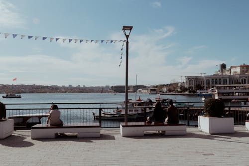 Sitting people in  haliç istanbul sanat 