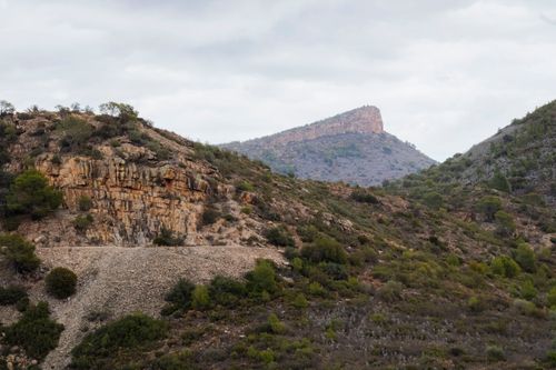 Free Scenic view of rocky mountains and lush shrubs in Valencia, Spain. Stock Photo