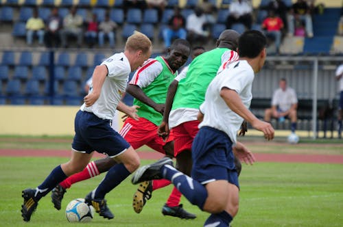 People Playing on Soccer Field