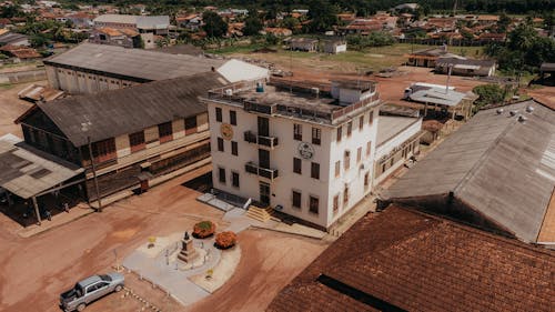 An aerial view of a building with a roof