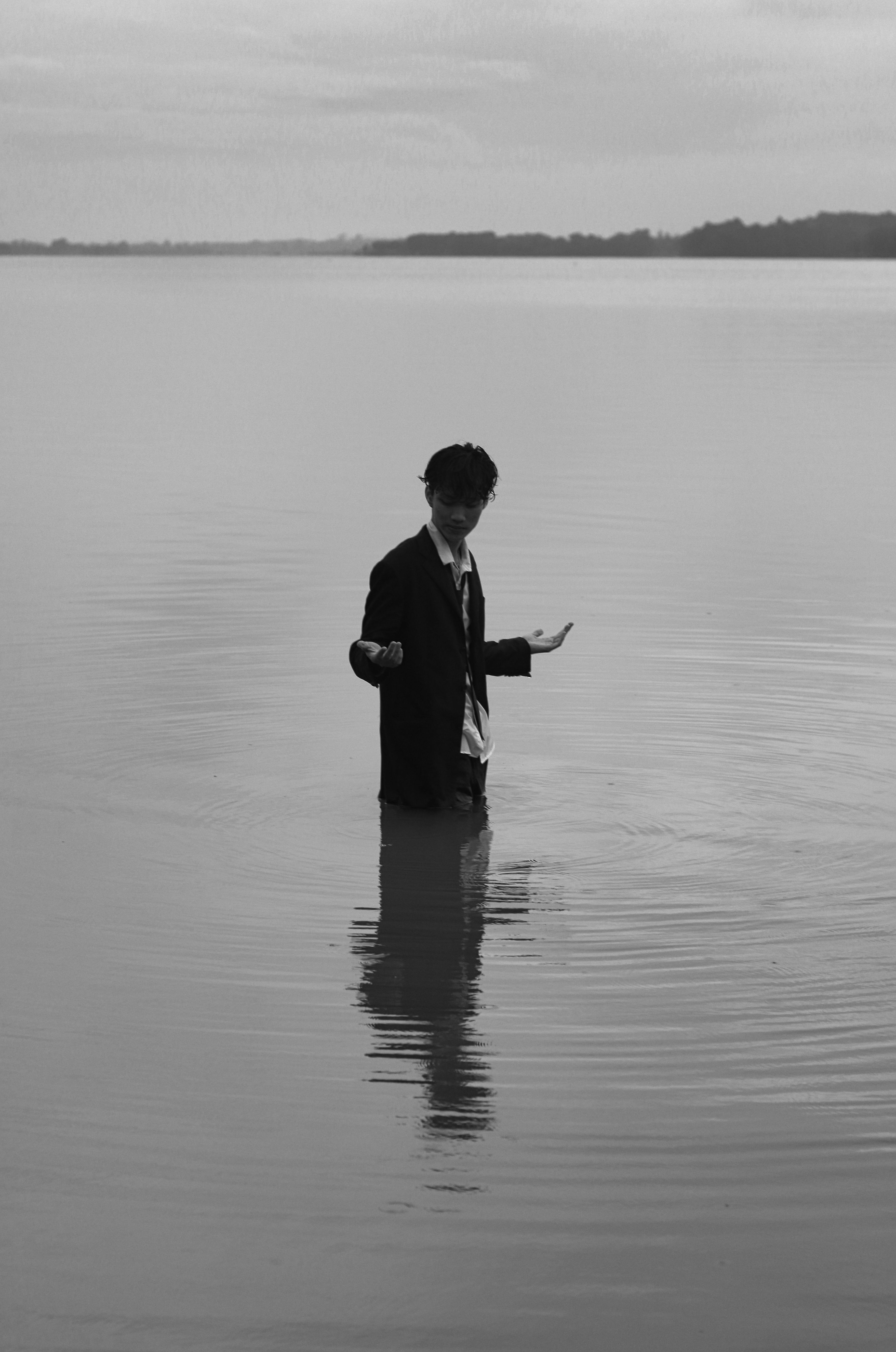 Man Half-way Submerged in Water Posing · Free Stock Photo