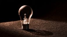 Clear Bulb on Brown Surface