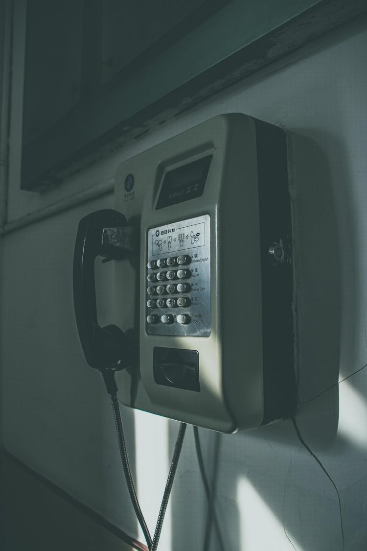 Gray And Black Public Phone